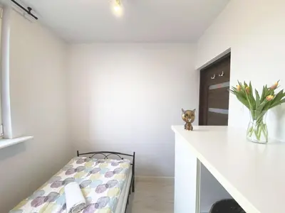 Łóżko lub łóżka w pokoju w obiekcie 3rooms-Balcony-PKP - DeerRest Apart