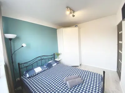 Łóżko lub łóżka w pokoju w obiekcie 3rooms-Balcony-PKP - DeerRest Apart