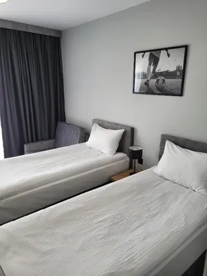 Łóżko lub łóżka w pokoju w obiekcie Hotel Igloo