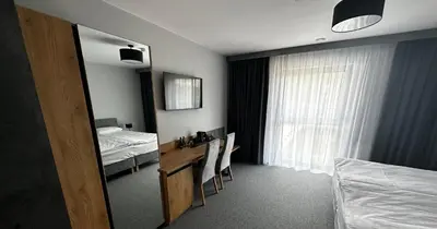 Łóżko lub łóżka w pokoju w obiekcie Hotel Igloo
