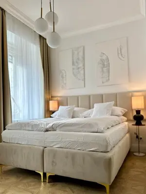 Łóżko lub łóżka w pokoju w obiekcie Olawska8 Apartment
