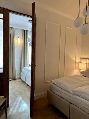 Łóżko lub łóżka w pokoju w obiekcie Olawska8 Apartment
