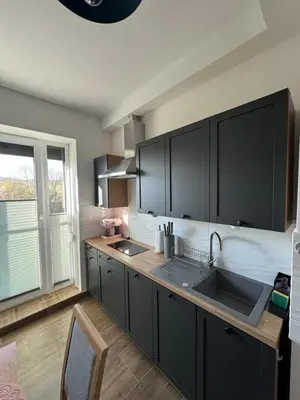 Kuchnia lub aneks kuchenny w obiekcie Wieczorek Apartment