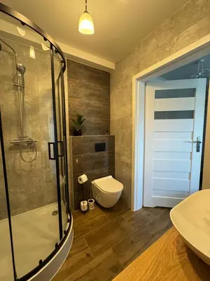 Łazienka w obiekcie Wieczorek Apartment