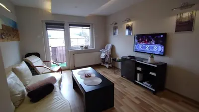 Telewizja i/lub zestaw kina domowego w obiekcie Apartament Lyszcze 7 Centrum Parking Balkon Blisko rynku Spokojna okolica