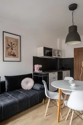 Kuchnia lub aneks kuchenny w obiekcie RentPlanet - Apartamenty Cybulskiego II