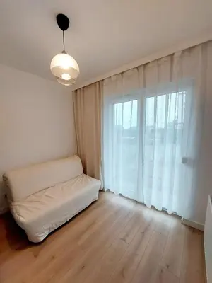 Łóżko lub łóżka w pokoju w obiekcie Luxury modern new apartment with garden&free parking,close to Wroclaw self check-in 24h