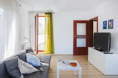 Telewizja i/lub zestaw kina domowego w obiekcie Komfort Parking Balkon