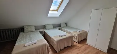 Łóżko lub łóżka w pokoju w obiekcie Hostel Milicka
