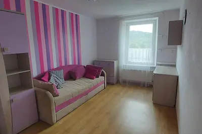 Łóżko lub łóżka w pokoju w obiekcie HarmonyHub