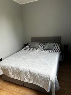 Łóżko lub łóżka w pokoju w obiekcie Apartament Helenka