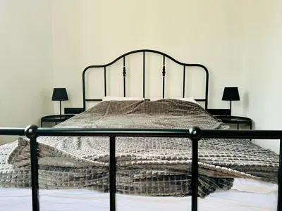 Łóżko lub łóżka w pokoju w obiekcie Apartamenty Maj Sokołowsko