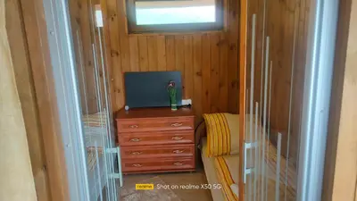 Telewizja i/lub zestaw kina domowego w obiekcie apartament w ogrodzie