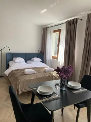 Łóżko lub łóżka w pokoju w obiekcie Apartament dla Dwojga