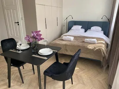Łóżko lub łóżka w pokoju w obiekcie Apartament dla Dwojga