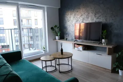 Telewizja i/lub zestaw kina domowego w obiekcie SpaceMore Apartments, Dmowskiego - 20 minut do RYNKU, Self Check-In 24H, Parking, City bikes