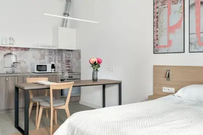 Łóżko lub łóżka w pokoju w obiekcie Beautiful White - Beige Apartments in Wrocław by Noclegi Renters