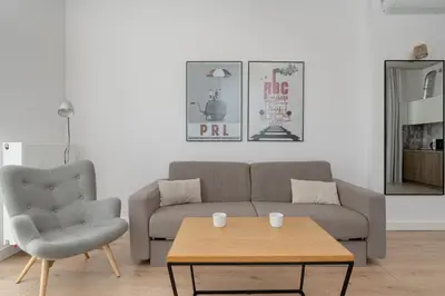 Część wypoczynkowa w obiekcie Beautiful White - Beige Apartments in Wrocław by Noclegi Renters
