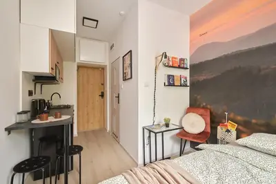 Łóżko lub łóżka w pokoju w obiekcie BLIŻEJ GÓR Jedlina-Zdrój. Apartament na 5