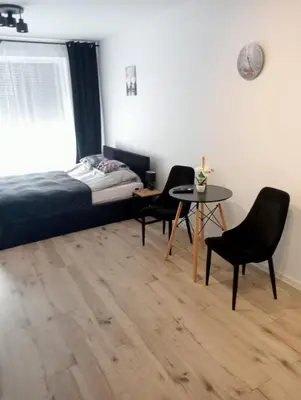 Łóżko lub łóżka w pokoju w obiekcie Apartament Diament 1 - Jezioro Nyskie