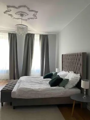 Łóżko lub łóżka w pokoju w obiekcie City Glamour Apartament
