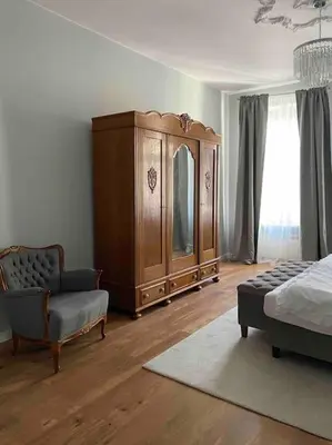 Łóżko lub łóżka w pokoju w obiekcie City Glamour Apartament