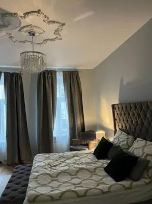 Łóżko lub łóżka w pokoju w obiekcie City Glamour Apartament