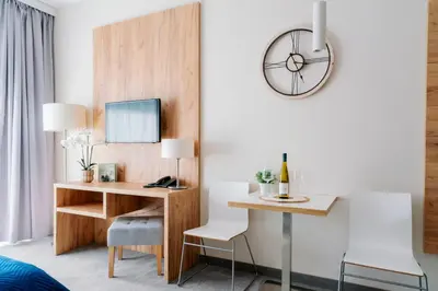 Telewizja i/lub zestaw kina domowego w obiekcie Apartament Folgaria - Aparthotel Panorama Czarna Góra