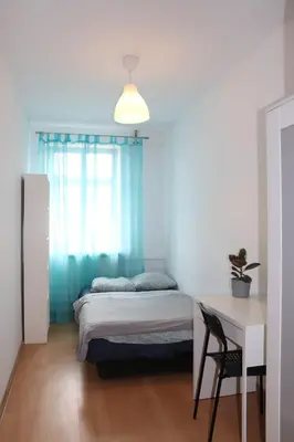 Łóżko lub łóżka w pokoju w obiekcie Noclegi - Wyspa Słodowa Rynek Centrum