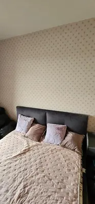 Łóżko lub łóżka w pokoju w obiekcie Apartamenty Natura