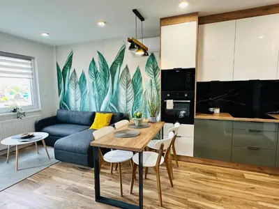 Kuchnia lub aneks kuchenny w obiekcie Apartamenty Dębowa 10