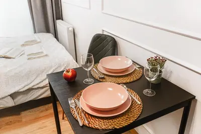 Łóżko lub łóżka w pokoju w obiekcie Stylowe Apartamenty w Centrum