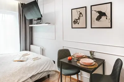 Łóżko lub łóżka w pokoju w obiekcie Stylowe Apartamenty w Centrum