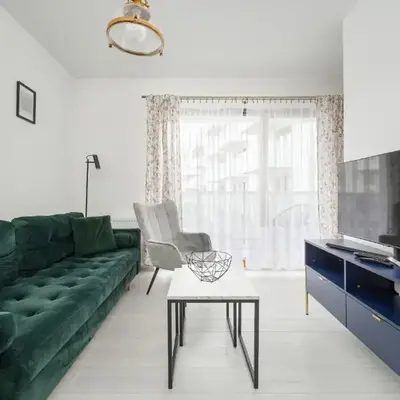 Modern Classic Studio Apartment in Kępa Mieszczańska by Noclegi Renters