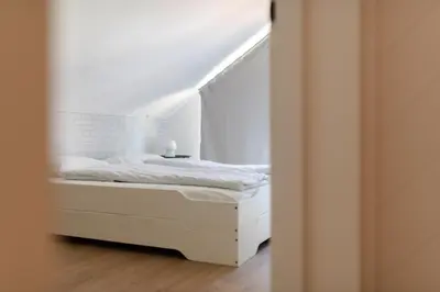 Łóżko lub łóżka w pokoju w obiekcie Na.Zadkach
