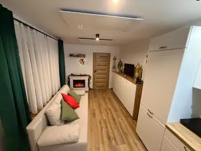 Część wypoczynkowa w obiekcie Apartament w Sercu Gór z ogrodem