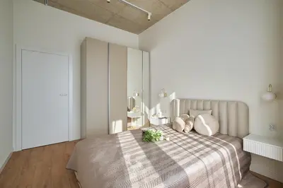 Łóżko lub łóżka w pokoju w obiekcie River Premium Apartments