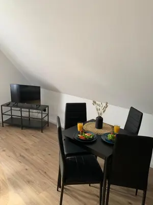 Telewizja i/lub zestaw kina domowego w obiekcie Apartamenty Astor - Słoneczny