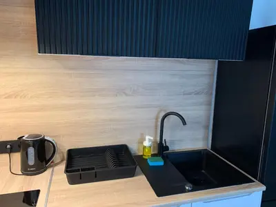 Kuchnia lub aneks kuchenny w obiekcie Apartamenty Astor - Słoneczny