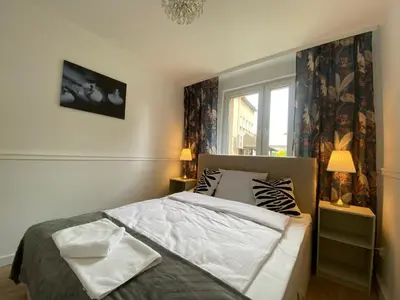 Łóżko lub łóżka w pokoju w obiekcie Tabago Studio 19