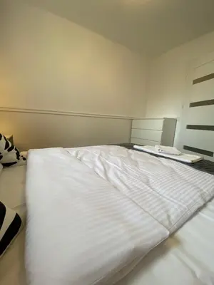 Łóżko lub łóżka w pokoju w obiekcie Tabago Studio 19