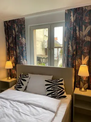 Łóżko lub łóżka w pokoju w obiekcie Tabago Studio 19