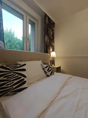Łóżko lub łóżka w pokoju w obiekcie Tabago Studio 19
