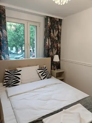 Łóżko lub łóżka w pokoju w obiekcie Tabago Studio 19