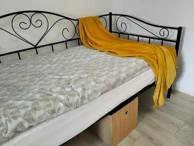 Łóżko lub łóżka w pokoju w obiekcie Apartament Alma