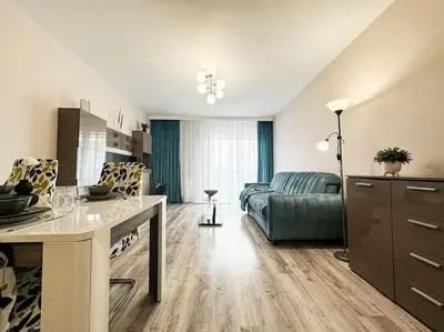Łóżko lub łóżka w pokoju w obiekcie Stylish Apartment - Balcony, Church Views, Parking! Tram