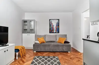 Telewizja i/lub zestaw kina domowego w obiekcie Komfort w sercu Miasta