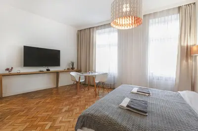 Telewizja i/lub zestaw kina domowego w obiekcie Komfort w samym Centrum