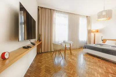 Telewizja i/lub zestaw kina domowego w obiekcie Komfort w samym Centrum