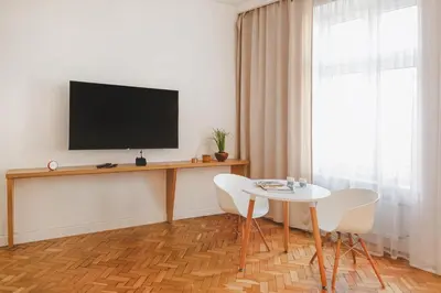Telewizja i/lub zestaw kina domowego w obiekcie Komfort w samym Centrum